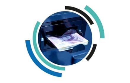 Transforming cash management with smart safes and cash recyclers – closeup of a Validator Mini in action.