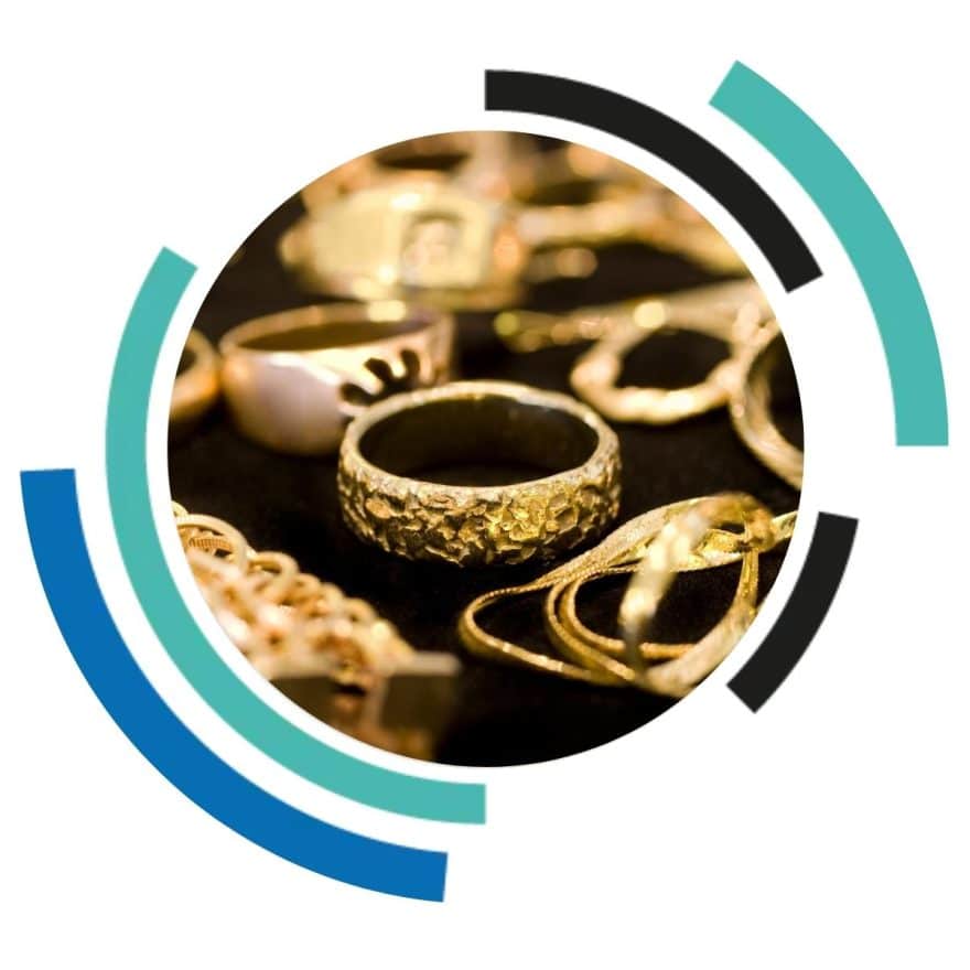 Gold jewellery including necklaces and rings, highlighting items typically stored in high-security jewellery safes
