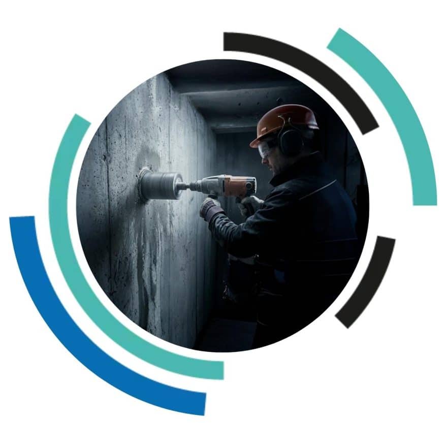 Core drill penetrating a strongroom wall demonstrating how attackers target structures and why a core drill proof strongroom is essential